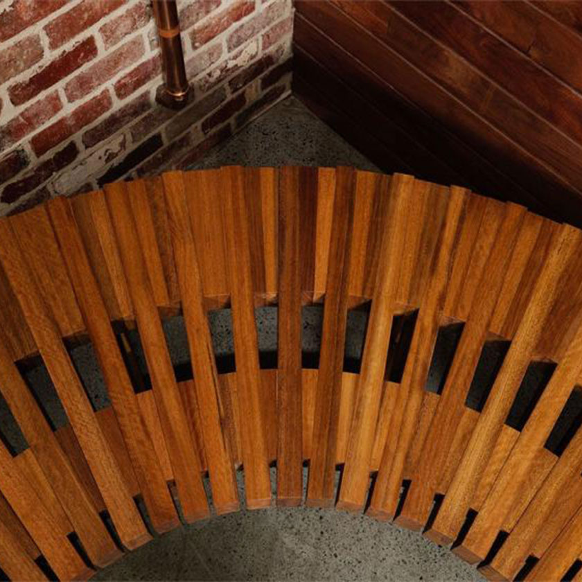 Close up of a timber bench in an industrial environment.